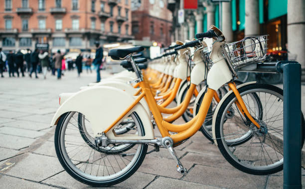 Rental bicycles standing in row on a town square
