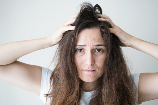 Upset Woman With Messy Hair Stock Photo - Download Image Now - 20-29 Years,  2018, Adult - iStock