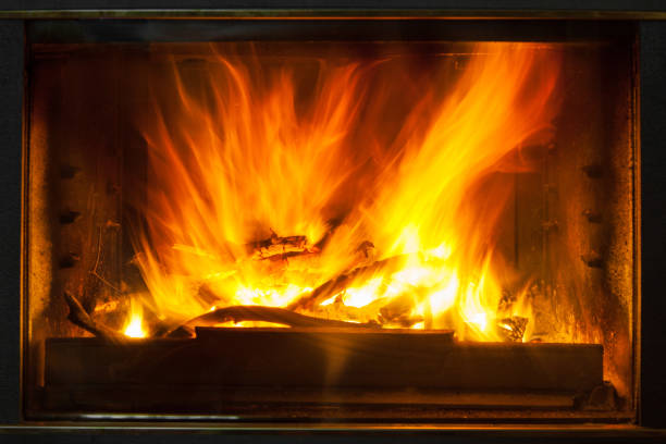 istock Burning billets in hot stove 1054470660