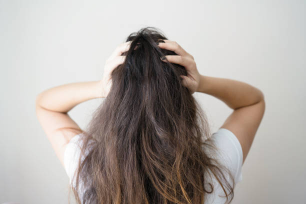 istock Upset woman with messy hair 1054474354