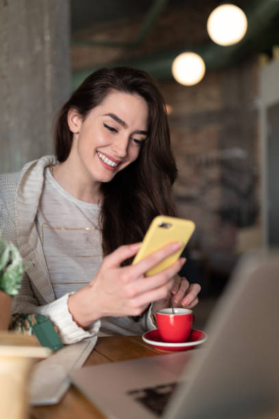istock Woman working online at a cafe 1054479052