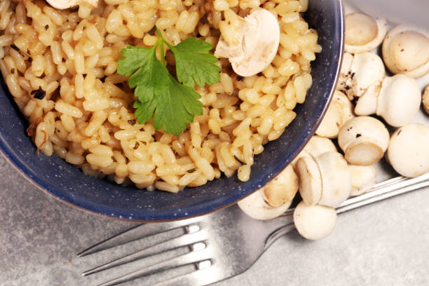 istock risotto with mushrooms, fresh herbs and parmesan cheese 1054481220