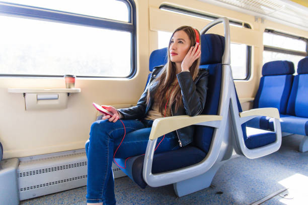 istock Listening music in subway 1054483768