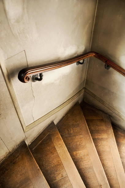 istock Old staircase in a French mansion 1054483810