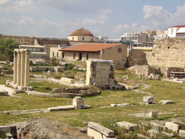 istock Greek building and ruin with columns 1 1054506302