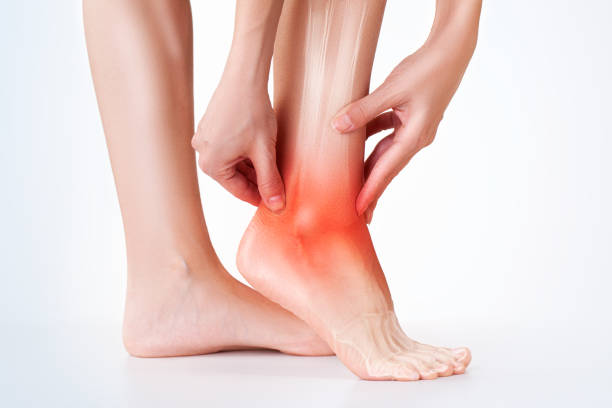 istock Ankle pain, foot painful point. 1054506940