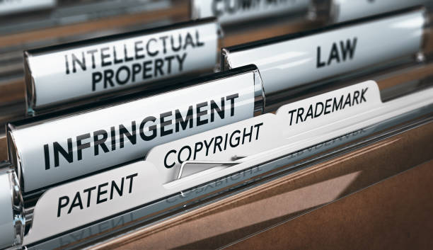 Intellectual Property Rights, Copyright, Patent or Trademark Infringement 3D illustration of a folder, focus on a tab with the word infringement. Conceptual image of copyright law intellectual property stock pictures, royalty-free photos & images