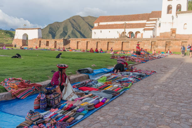 Peruvian women at market, Chinchero , Peru Chinchero, Peru - March 9, 2015: Peruvian women dressed in traditional clothes at local market chinchero district stock pictures, royalty-free photos & images