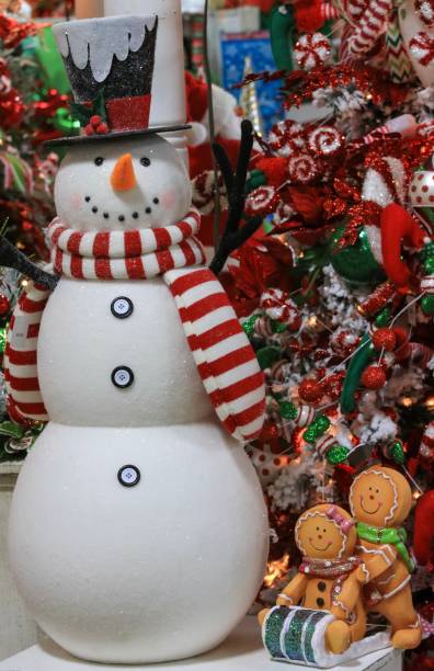istock Christmas decorations with ribbon snowman and gingerbread people 1054520144