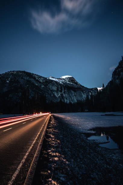 istock Yosemite Winter Night with Light trails 1054521316