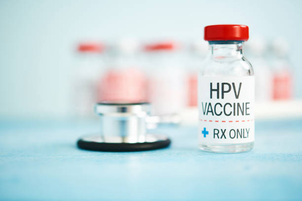 Medical Vial with HPV Vaccine Medical Vial with HPV Vaccine human papilloma virus photos stock pictures, royalty-free photos & images