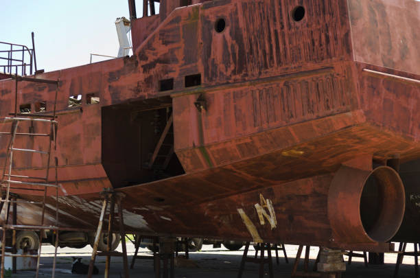 istock fishing boat in repair 1054532994