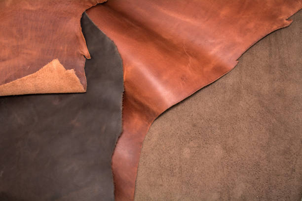 istock Texture of pieces brown leather. Natural material background 1054546082