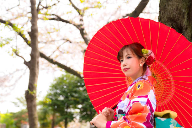 istock Young asian girl wearing kimono (Japanese traditional clothes). 1054548384
