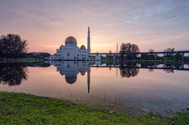 istock Tranquil lake surrounded As-Salam Mosque located in Selangor, Malaysia with reflection on the lake. 1054548396