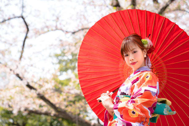istock Young asian girl wearing kimono (Japanese traditional clothes). 1054548420