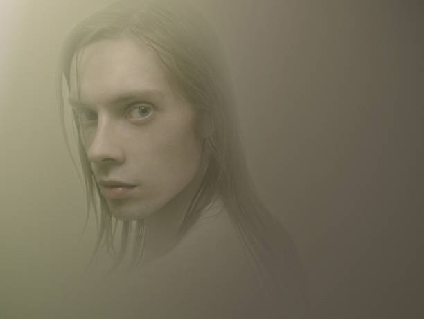 istock guy with the long hair 1054550226