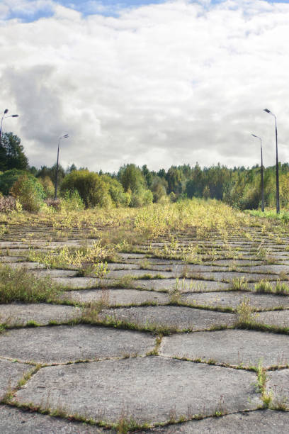 istock paved construction of concrete tiles road 1054551986