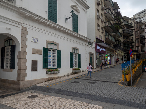 Macau/China - August 15 2018: Travessa do Roquette street in the UNESCO Historic Centre of Macau World Heritage Site.