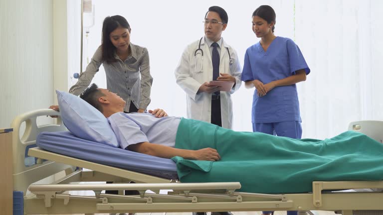 Crane shot: Doctor explaining treatment method to senior patient and his relative