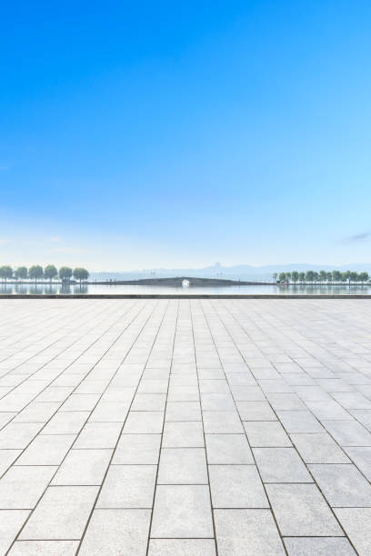 istock Empty floor and beautiful west lake scenery in hangzhou 1054572258