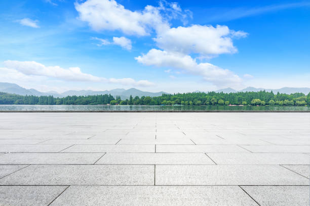 istock Empty floor and beautiful mountain with lake 1054572410