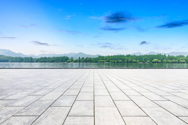 istock Empty floor and beautiful mountain with lake 1054572566