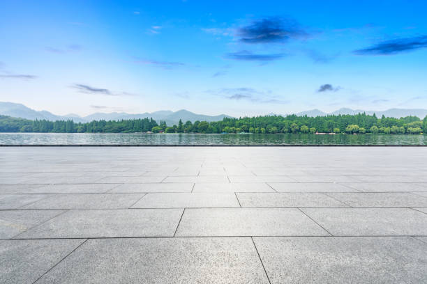 istock Empty floor and beautiful mountain with lake 1054573580