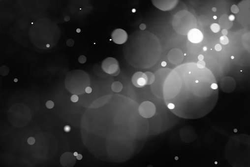 Abstract black and white bokeh light background. Abstract bokeh light