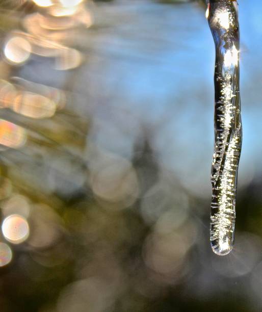 Ice crystal with light reflection stock photo