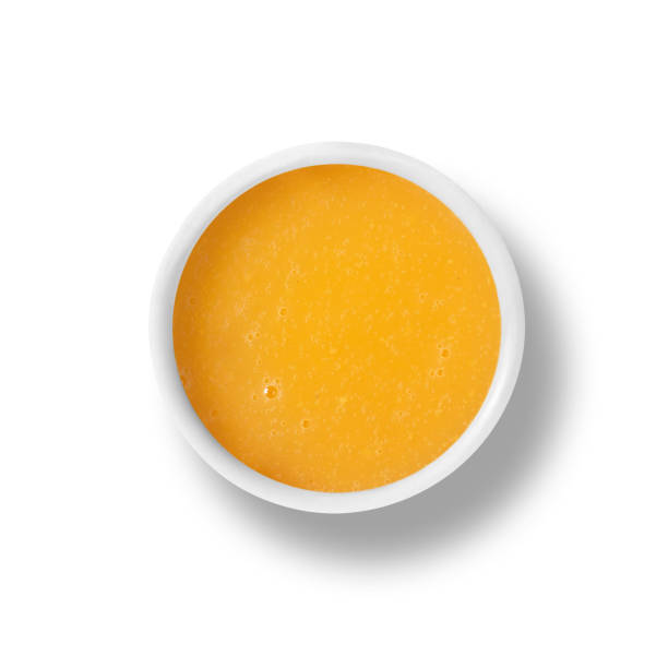 vinaigrette orange en coupe isolé sur blanc - orange sauce photos et images de collection