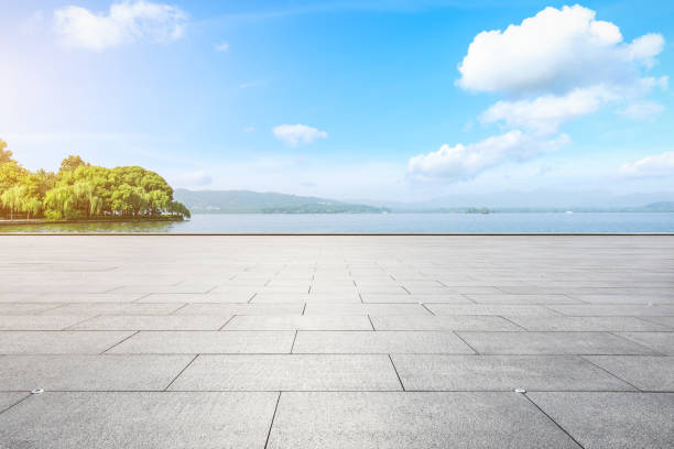 istock Empty floor and beautiful mountain with lake 1054585856