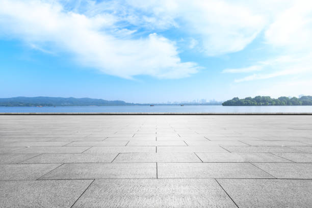 istock Empty floor and beautiful mountain with lake 1054585982