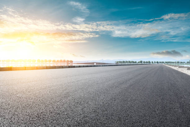 istock Empty asphalt road and beautiful West Lake scenery in Hangzhou 1054591004