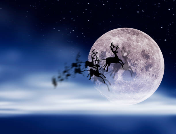 istock Santa Claus Sleight and Reindeers Silhouette Flying over the Moon 1054593068