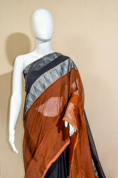 istock A traditional indian colorful silk saree displayed for sale. 1054610208