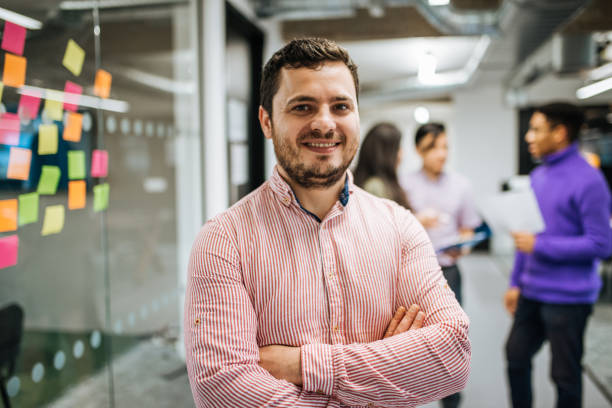istock Portrait of project manager in multinational team 1054612970