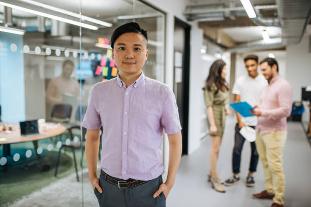 istock Multi-ethnic business team led by Taiwanese guy 1054614672