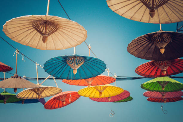 istock Colorful umbrellas arranged in rows but in random colors to give an interesting effect. 1054615184
