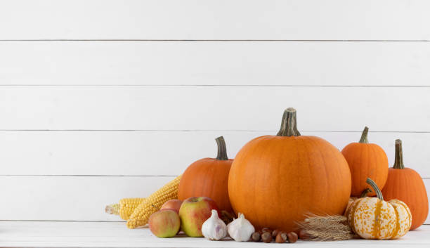 istock Autumn harvest on wooden table 1054617170
