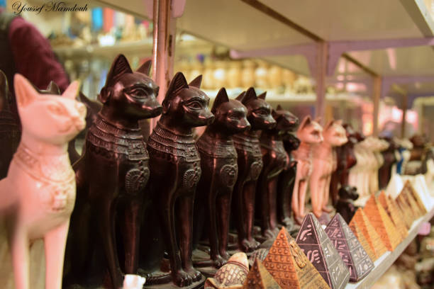istock Old Egyptian Bazaar selling Egyptian traditional Souvenirs 1054618324