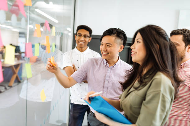 istock Multi-ethnic business team in modern start-up in United Kingdom 1054621504
