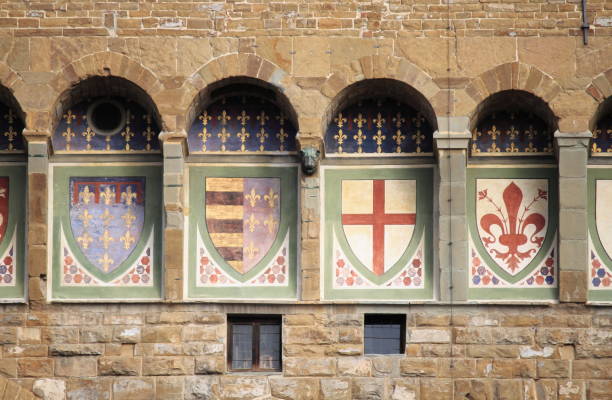 Emblems in the facade of Palazzo Vecchio of Florence. Italy