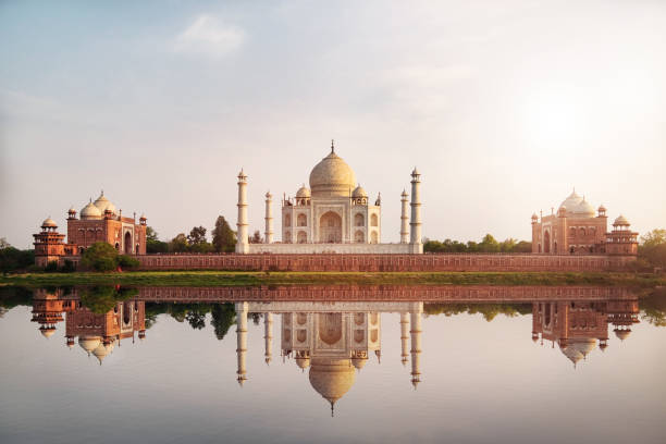 istock Sun set at Taj Mahal seen from Mehtab Bagh reflect on Yamuna river. 1054631290