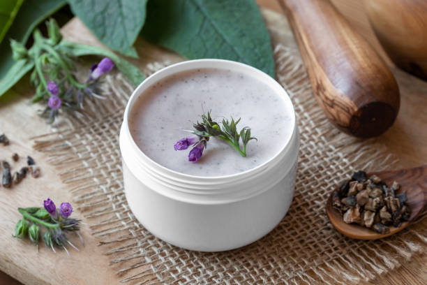 istock A jar of homemade comfrey ointment with fresh comfrey 1054637174