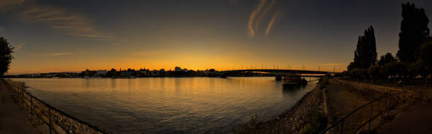 istock A city is preparing for the evening in the sunset 1054653488