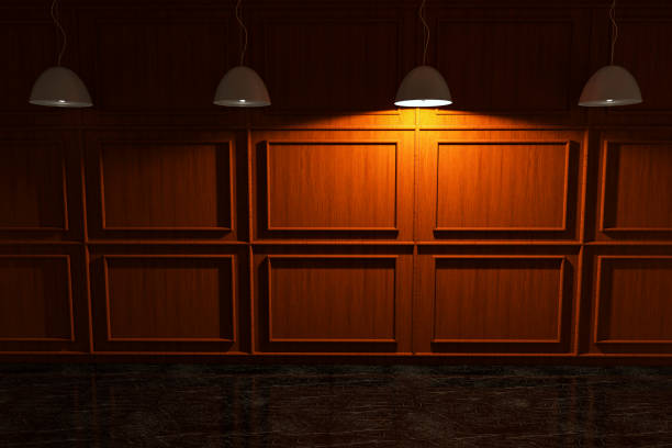 istock Light Lamp Standing Out From The Crowd. Dark Room. 1054655296