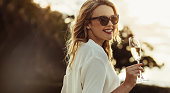 Elegant woman with a glass of wine