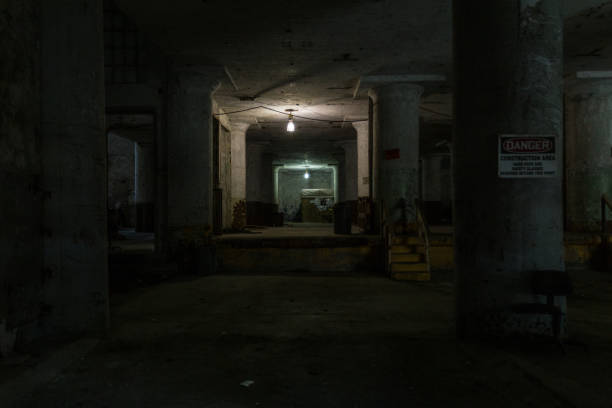 istock Small light in background of rehabbing building 1054676428