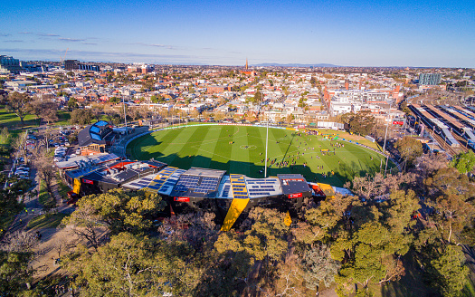Australia: Punt Road Oval, home of the Richmond Tigers AFL cub, with Richmond train station and Punt Road in the background.
